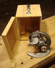 Storage cabinet for a dissecting microscope