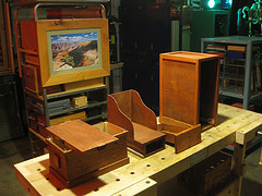 a box done with thin materials and a cabinet with a sliding drawer